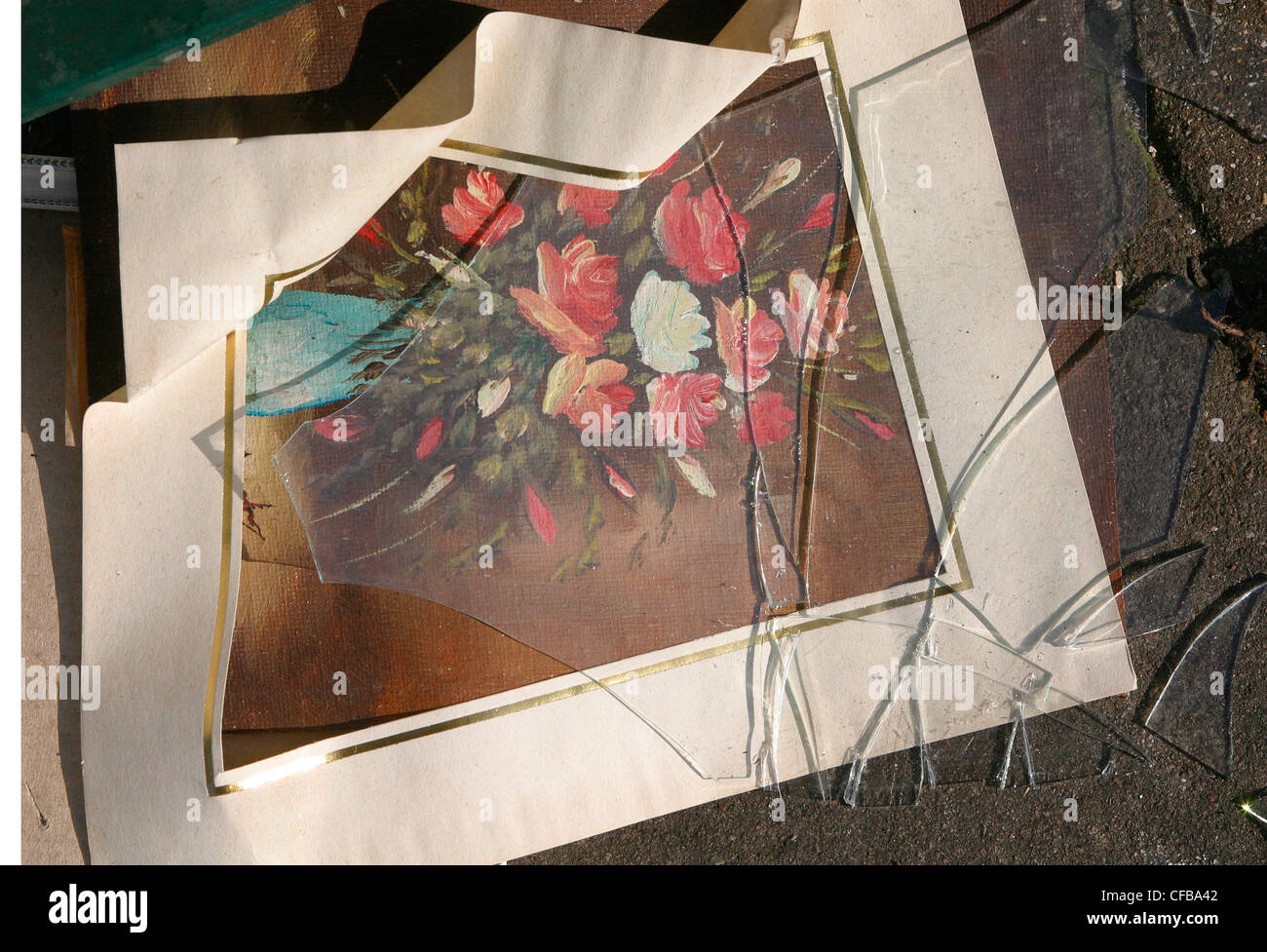 Broken painting of flowers on the pavement in Brick Lane Stock Photo Alamy