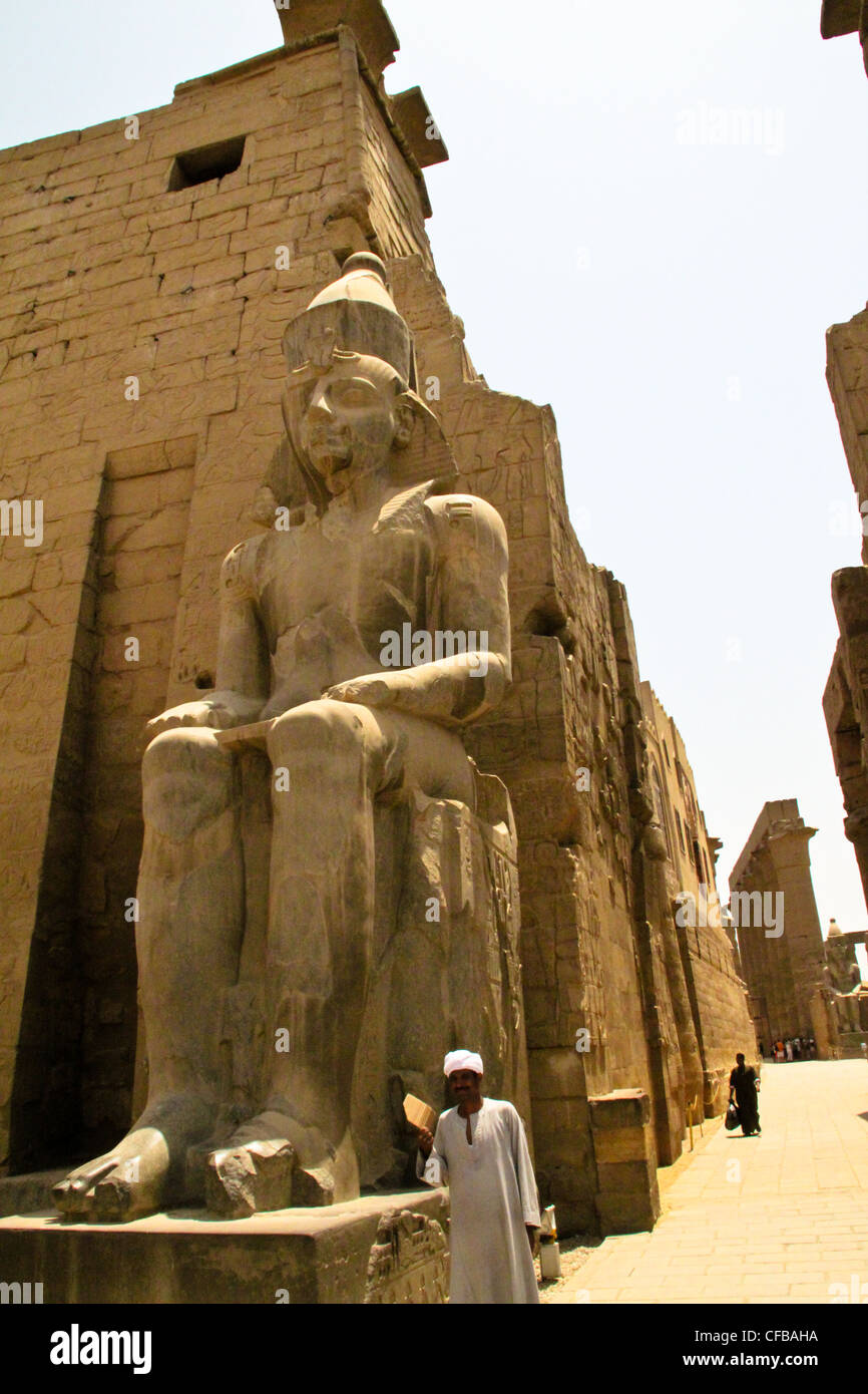 Statue of Pharaoh Ramses II in the great temple of Karnak dedicated to ...