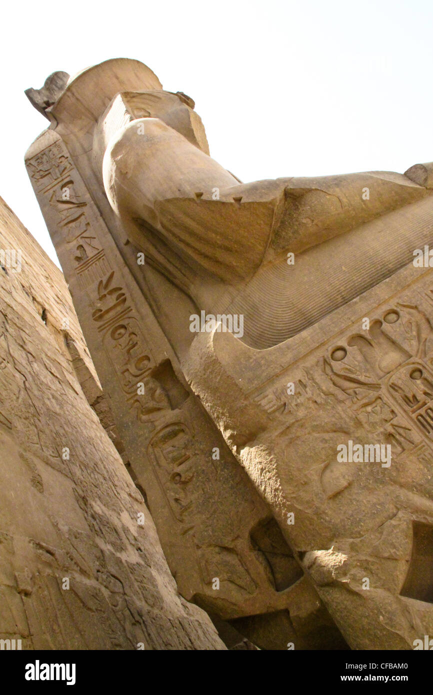 Statue of Pharaoh Ramses II in the great temple of Karnak dedicated to ...