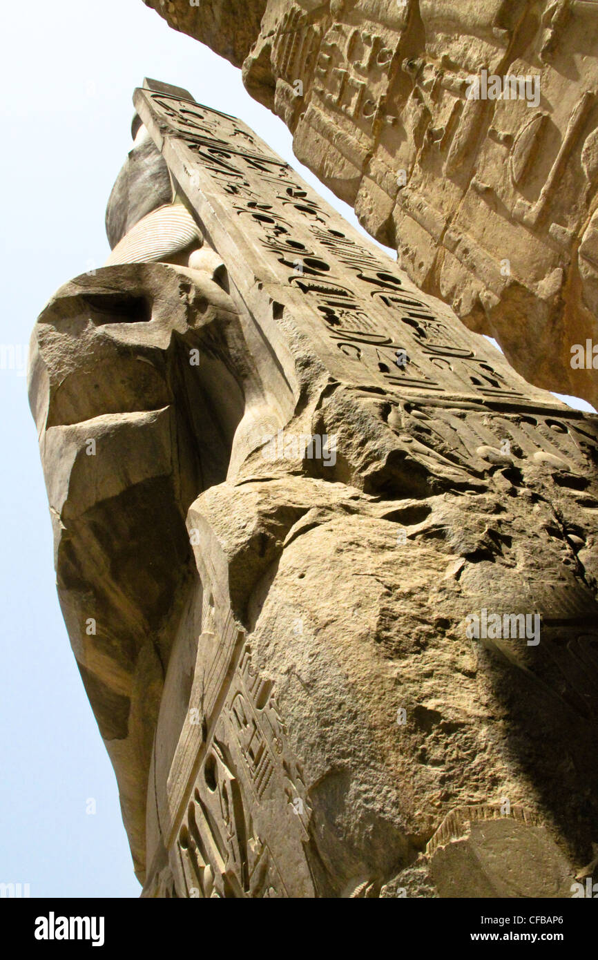 Statue of Pharaoh Ramses II in the great temple of Karnak dedicated to ...