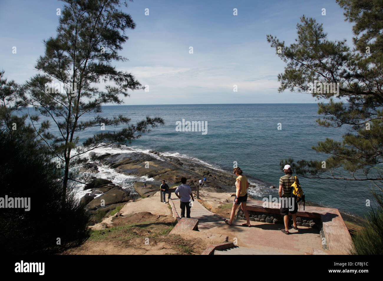 Tourists visiting the Tip of Borneo in Borneo, Malaysia Stock Photo