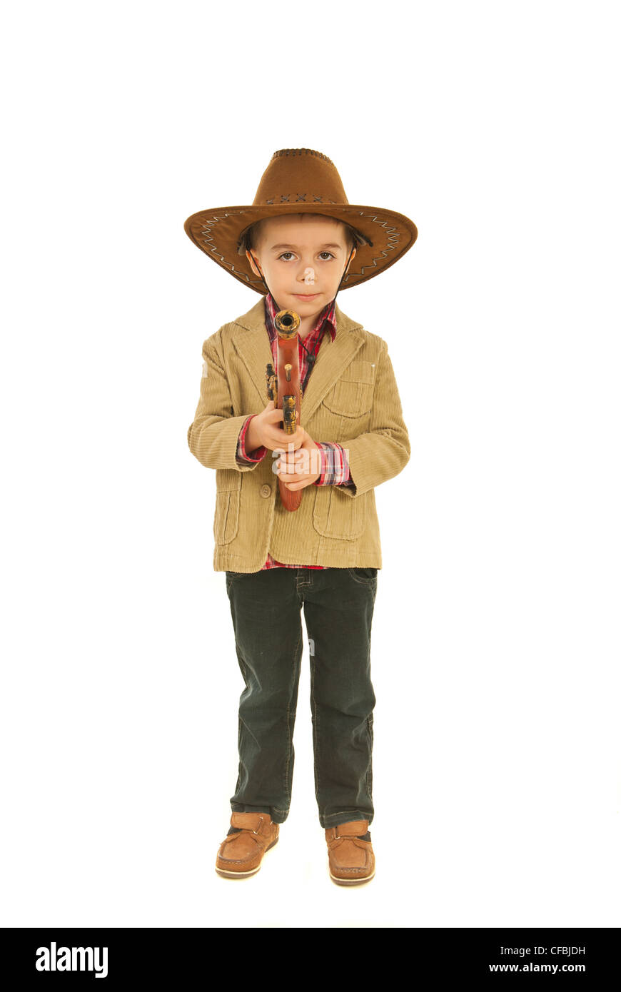 Full length of little cowboy holding weapon toy isolated on white background Stock Photo