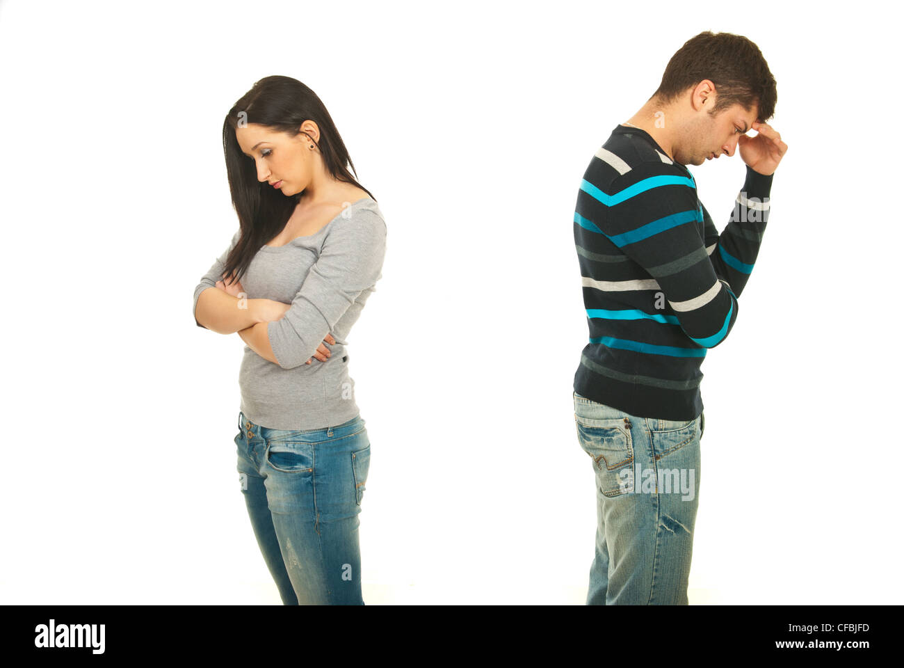 Sad couple having conflict isolated on white background Stock Photo - Alamy
