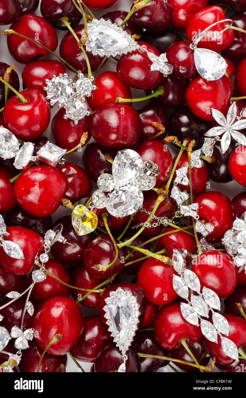Jewels at fruit red ripe cherries berry background Stock Photo Alamy