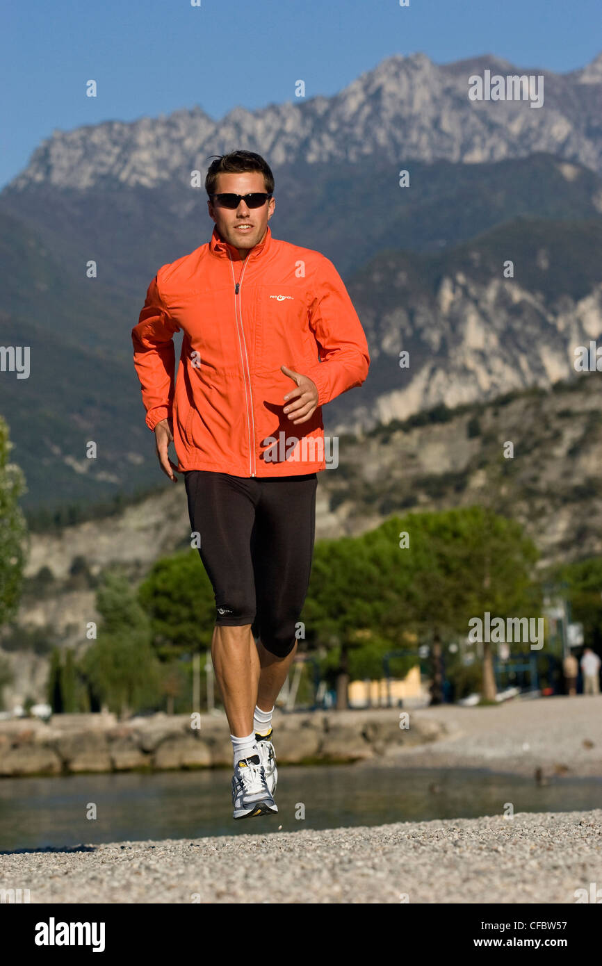 Man running at lake garda hi-res stock photography and images - Alamy