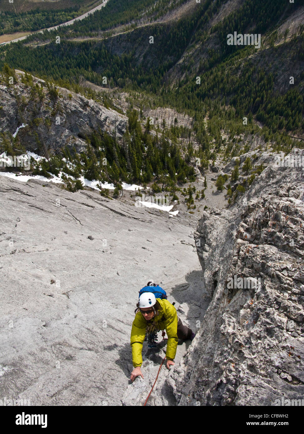 A man rock climbing, Escargot Corner 5.7, Banff National Park, Alberta