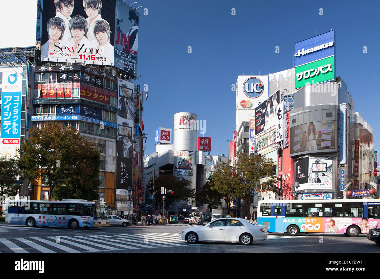 Japan, Asia, Tokyo, city, Shibuya, West Shibuya, Station, advertisement, blue, busy, colourful, crossing, shopping, square, traf Stock Photo
