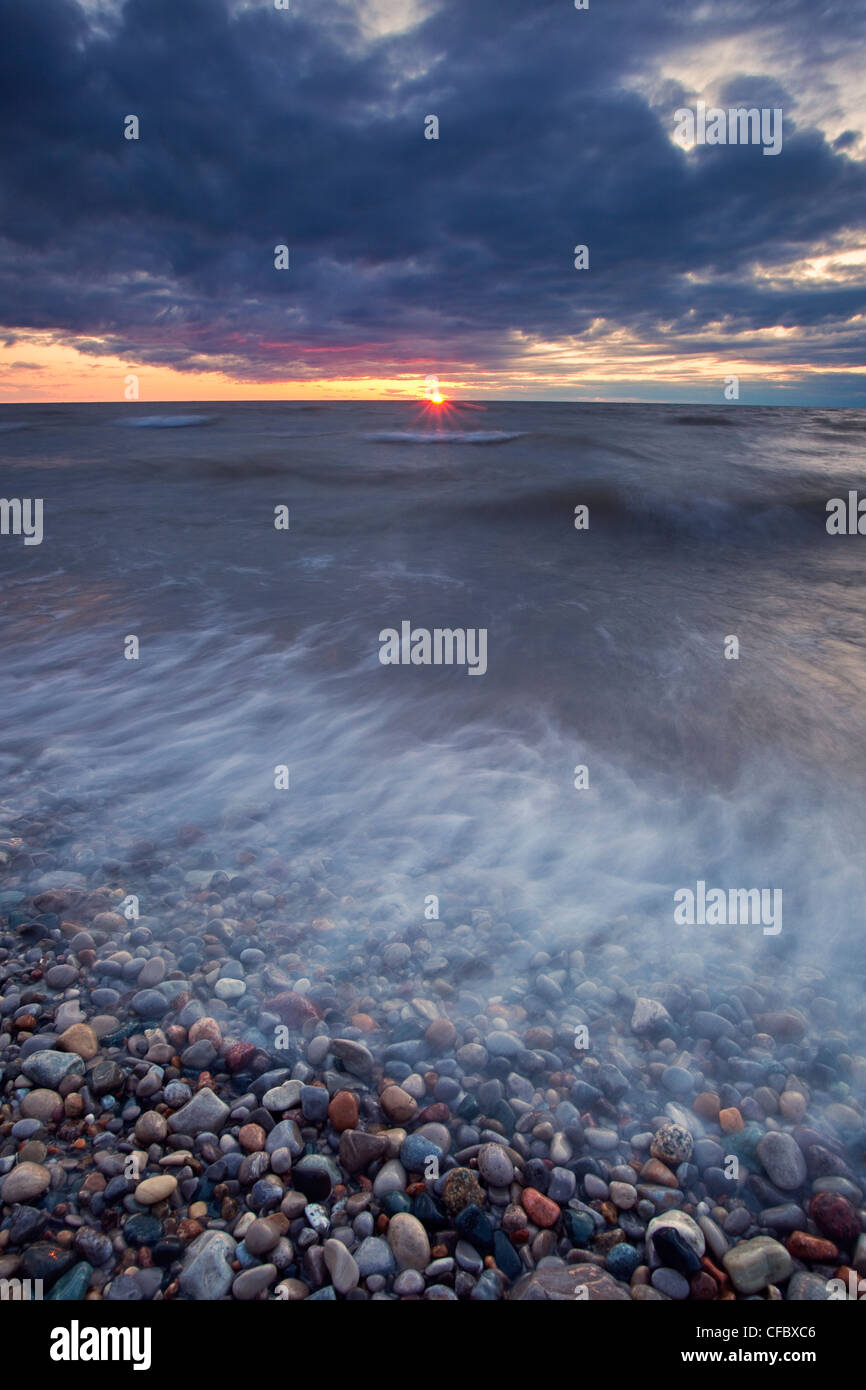 Sunset on on the shore of Lake Huron near Grand Bend Ontario Stock