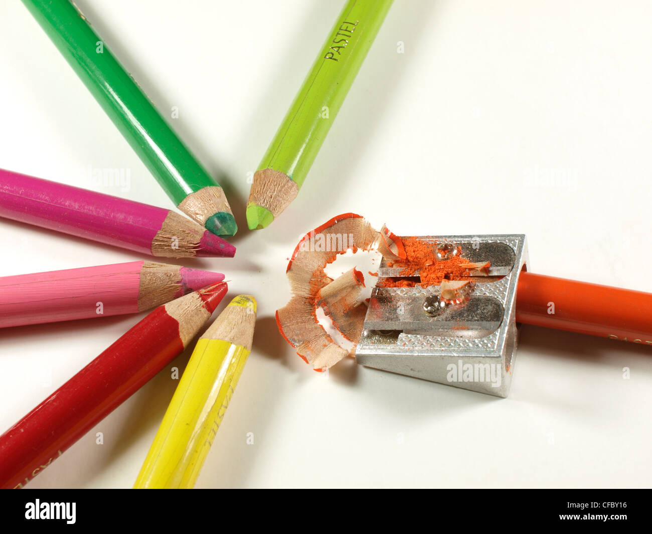 Sharpening pastel pencils Stock Photo