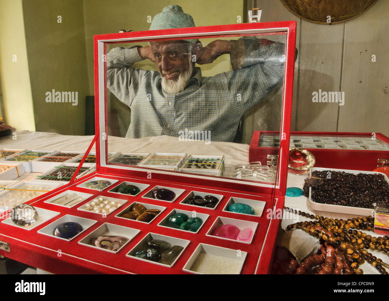 a Moslem gem dealer shows his jewels near Kandy, Sri Lanka Stock Photo