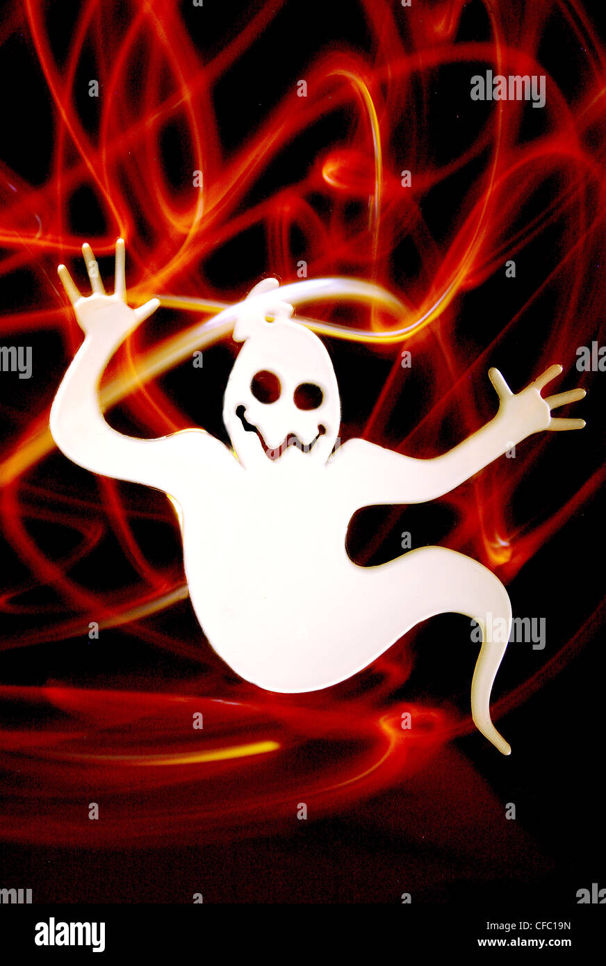 A scary Halloween ghost with swirly red light Stock Photo