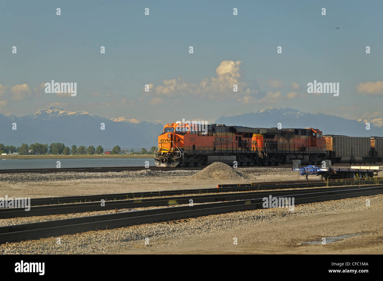 Burlington Northern Santa Fe Railway (BNSF) train approaching Roberts Bank Coal Port, South Delta, British Columbia, Canada Stock Photo