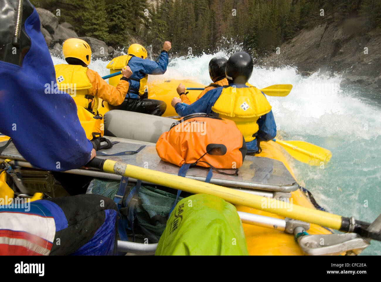 A group of whitewater rafters descend Bidwell's Falls on the Chilko River, British Columbia, Canada Stock Photo