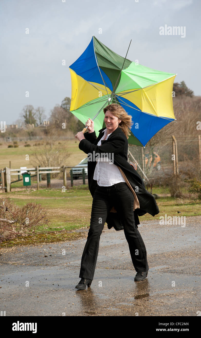 Umbrella blowing wind hires stock photography and images Alamy