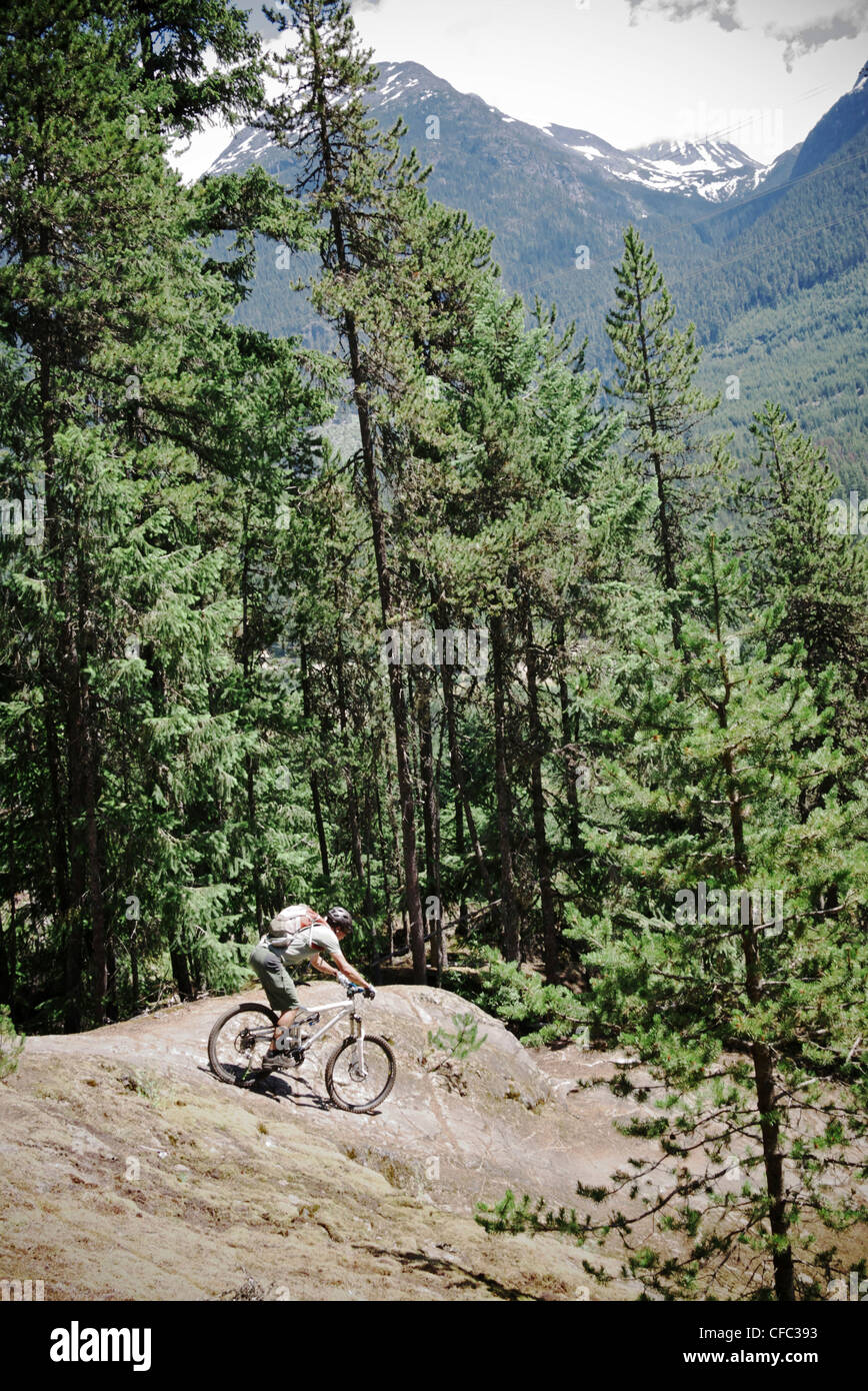 Pictures Slab Riding Man riding a steep granite slab on Kill Me Thrill Me near Whistler ...
