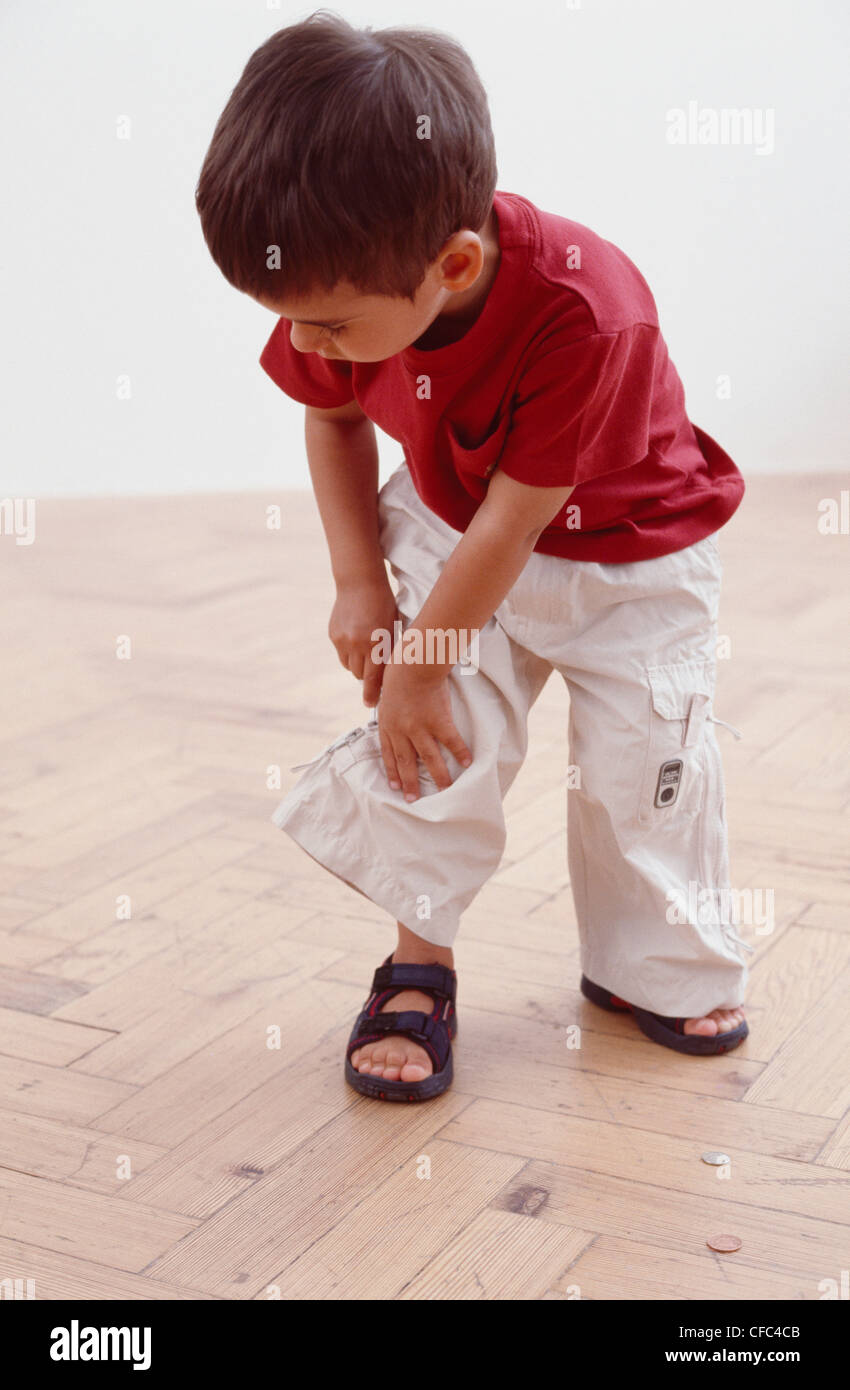 Boy wearing sandals hi-res stock photography and images - Alamy