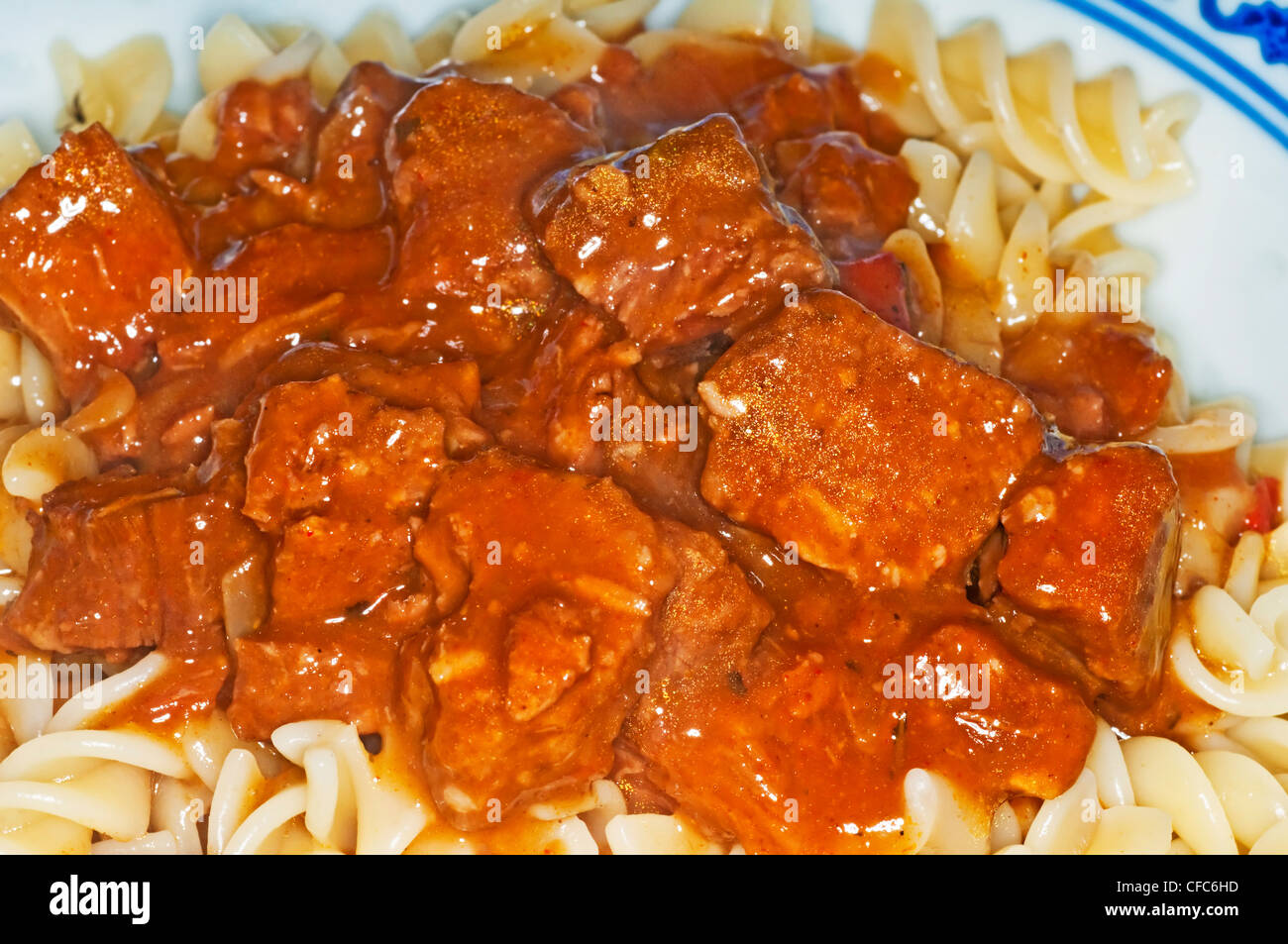goulash of beef with noodles Stock Photo - Alamy
