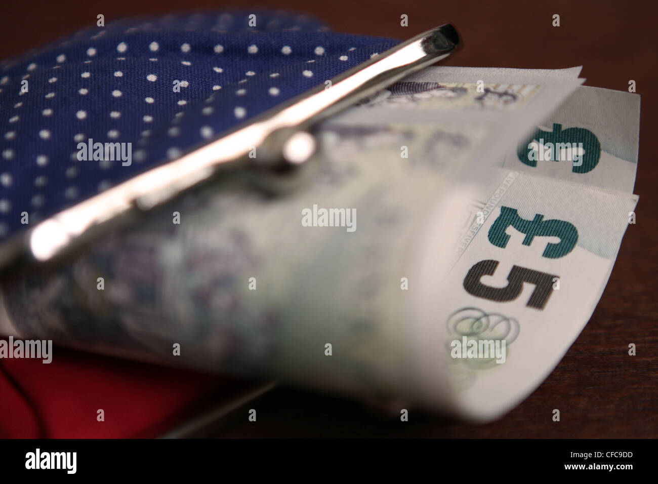 Cash sticking out wallet hi-res stock photography and images - Alamy
