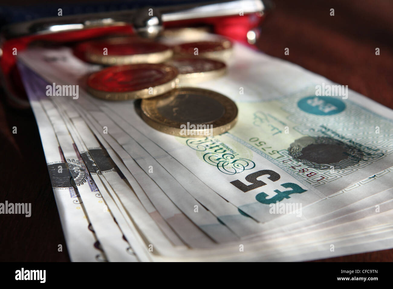 Open purse coins hi-res stock photography and images - Alamy