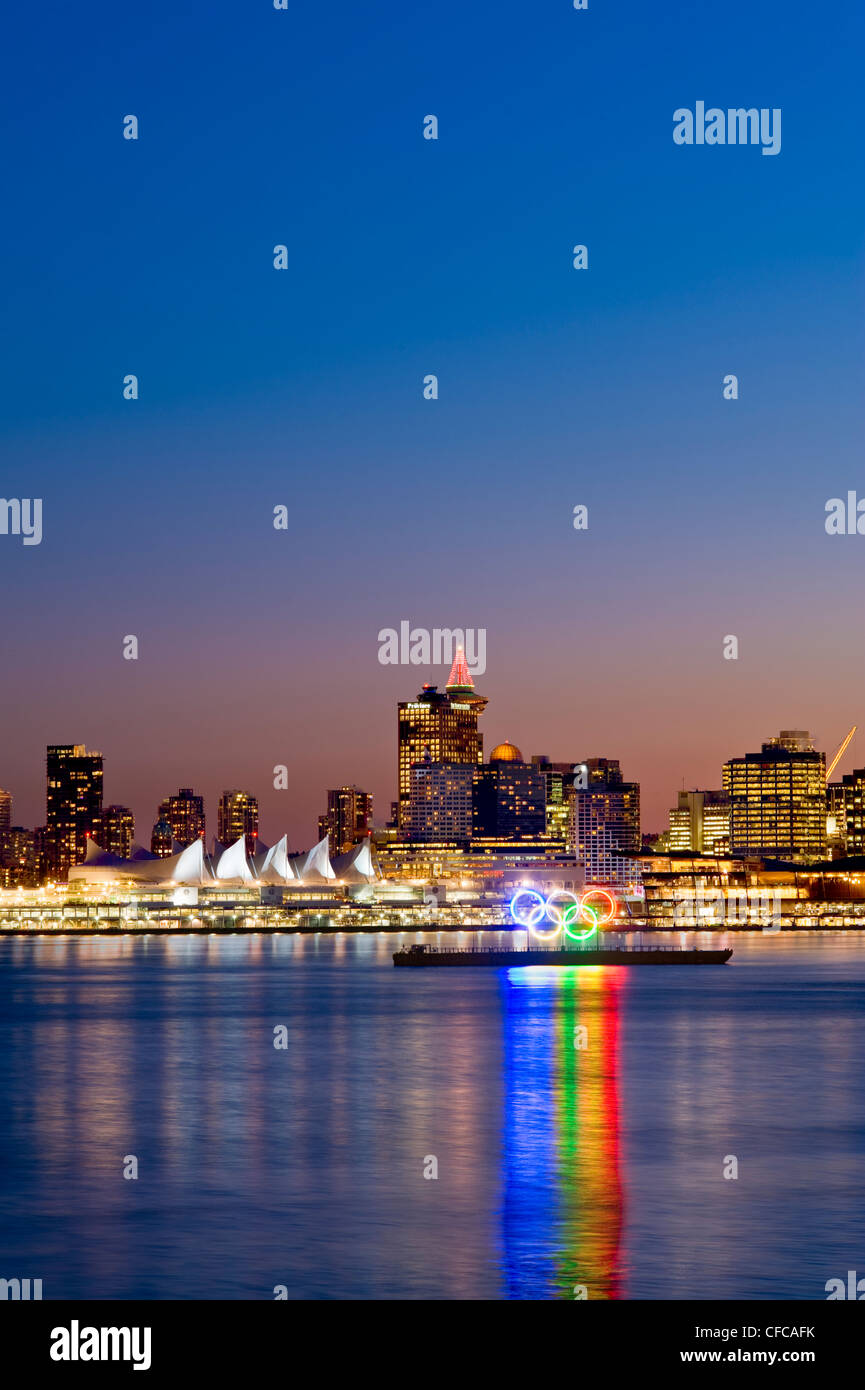 Olympic rings and Vancouver skyline Stock Photo