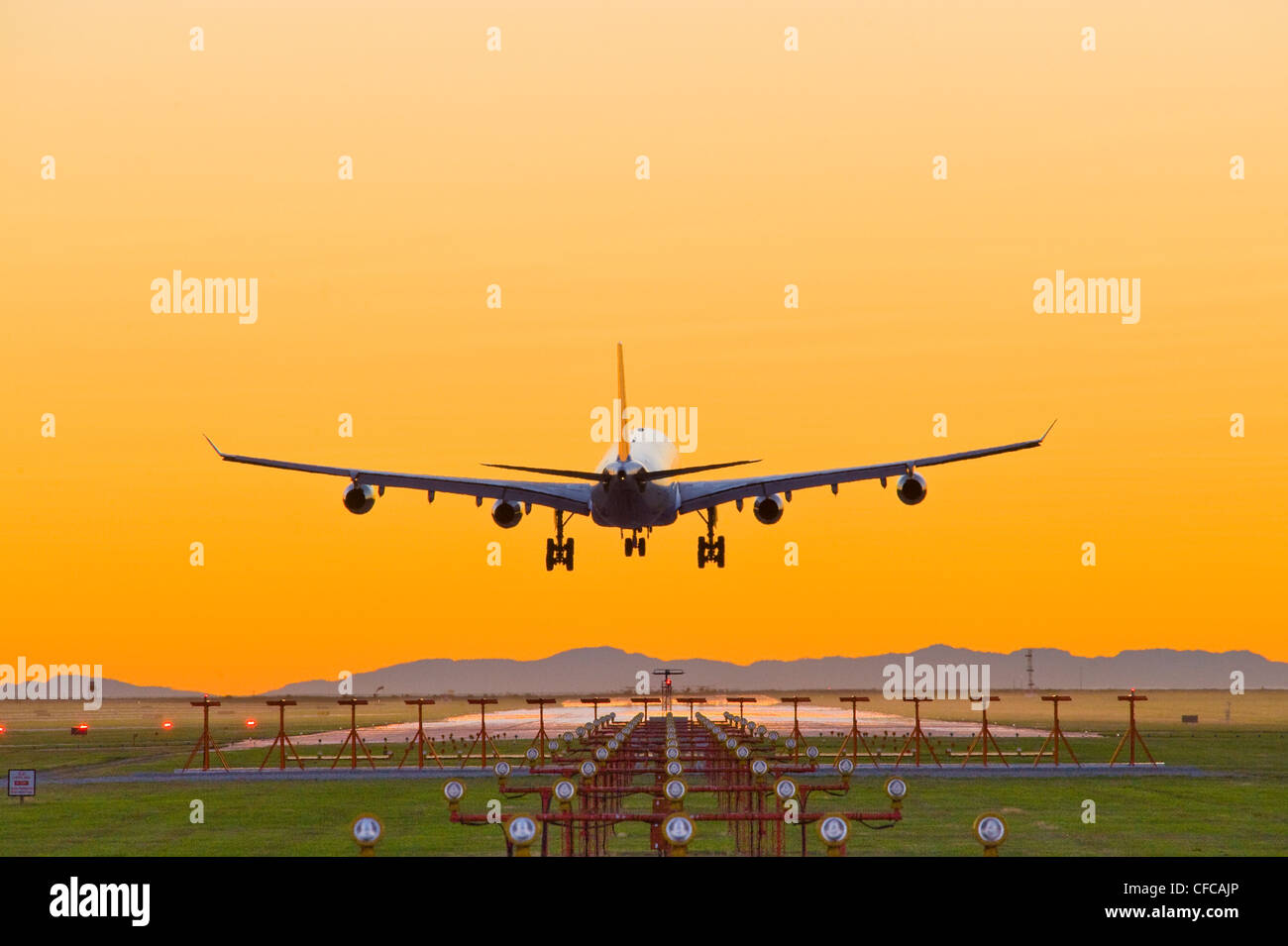 Airbus 340 landing at Vancouver International Airport Stock Photo - Alamy