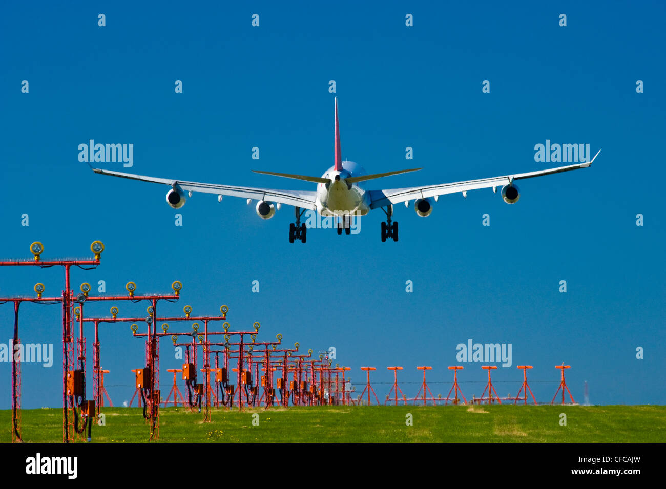 A 340 landing at Vancouver International Airport. Stock Photo