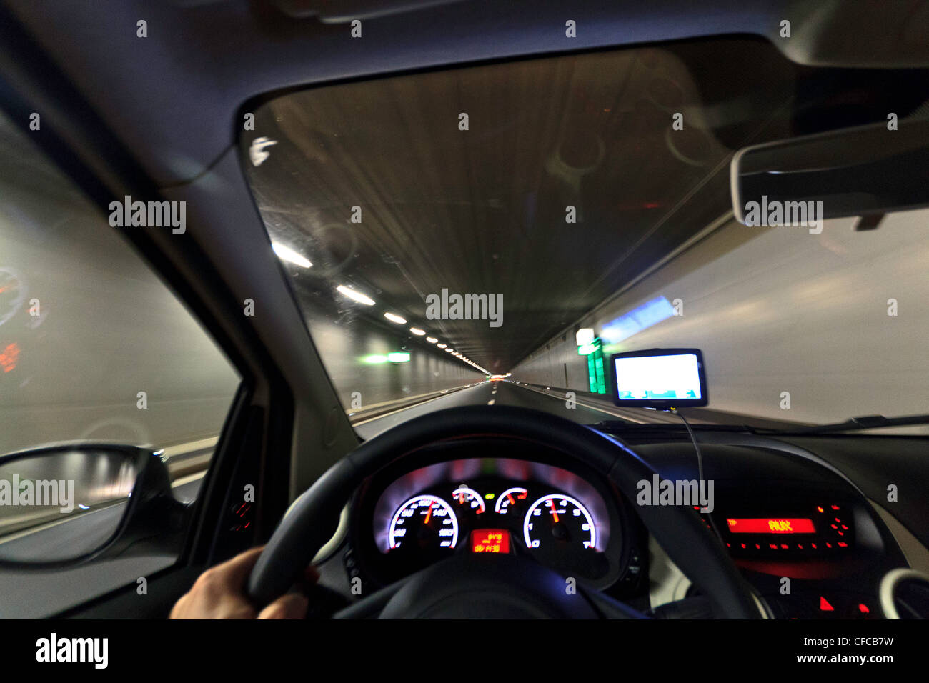 car, driving, travel, tunnel, Switzerland, steering, wheel, lights Stock Photo