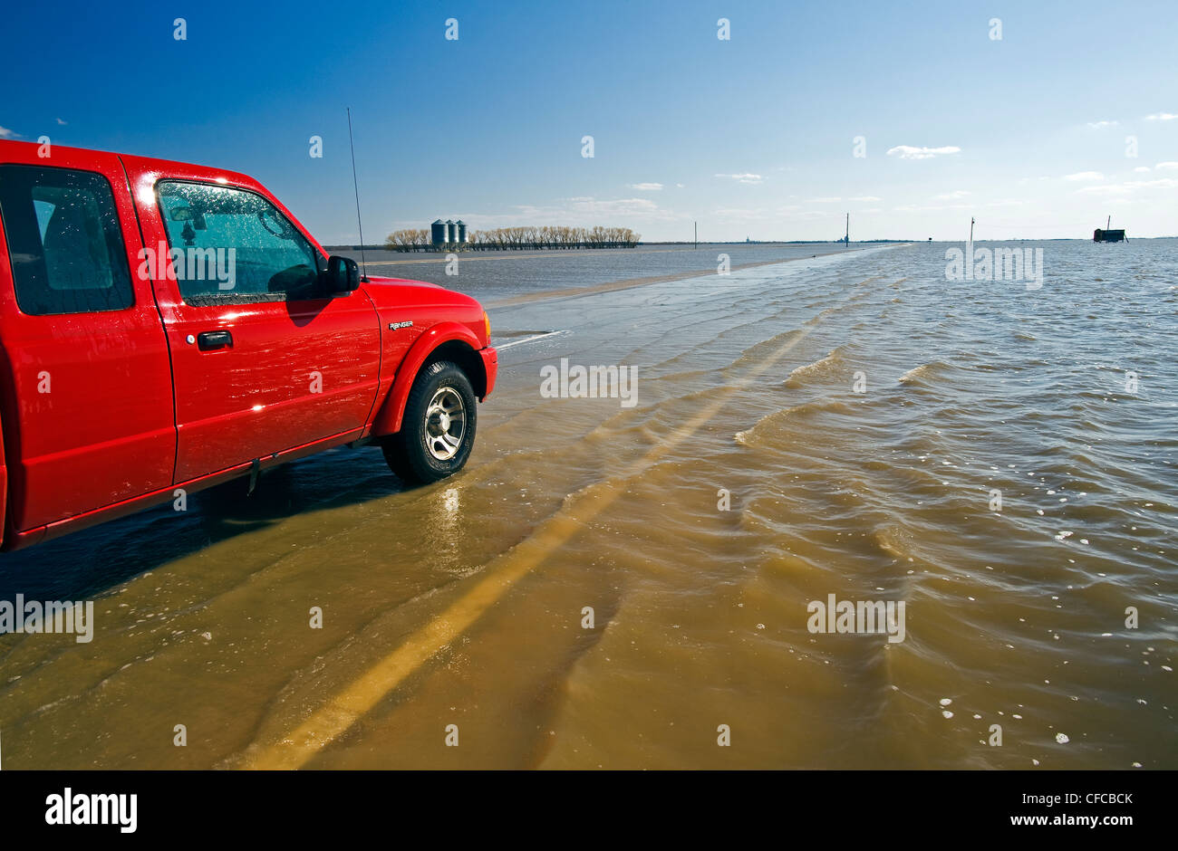 Red River flooding of Highway 75 and farmland in the Red River Valley