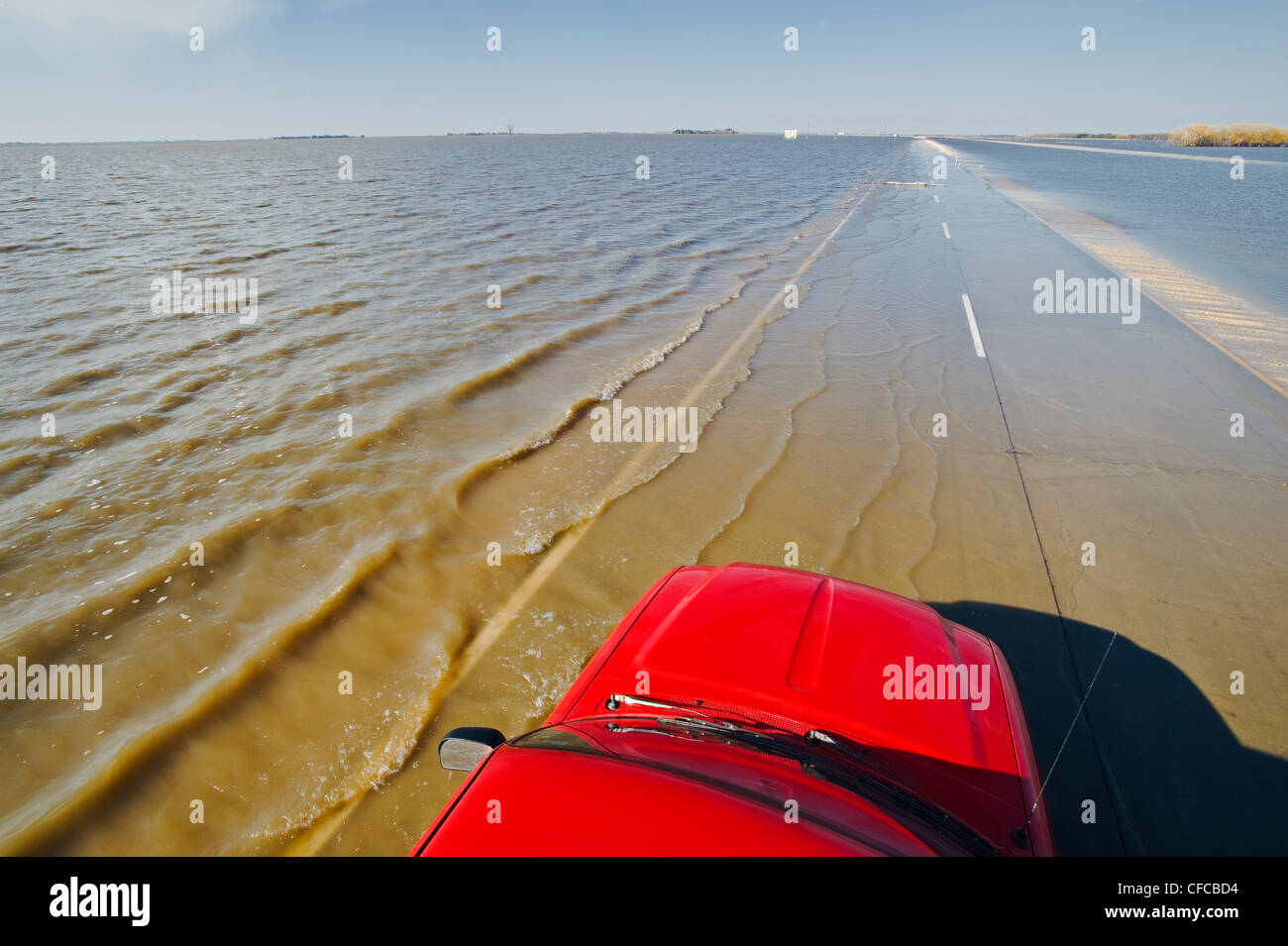 Red River flooding of Highway 75 and farmland in the Red River Valley
