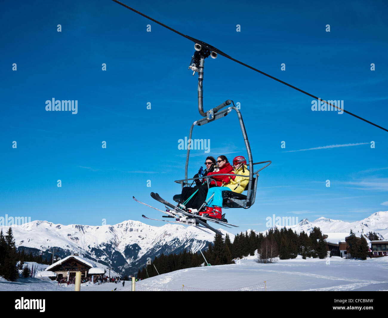 Chair lift at Courchevel 1850 ski resort in Three Valleys France Stock Photo