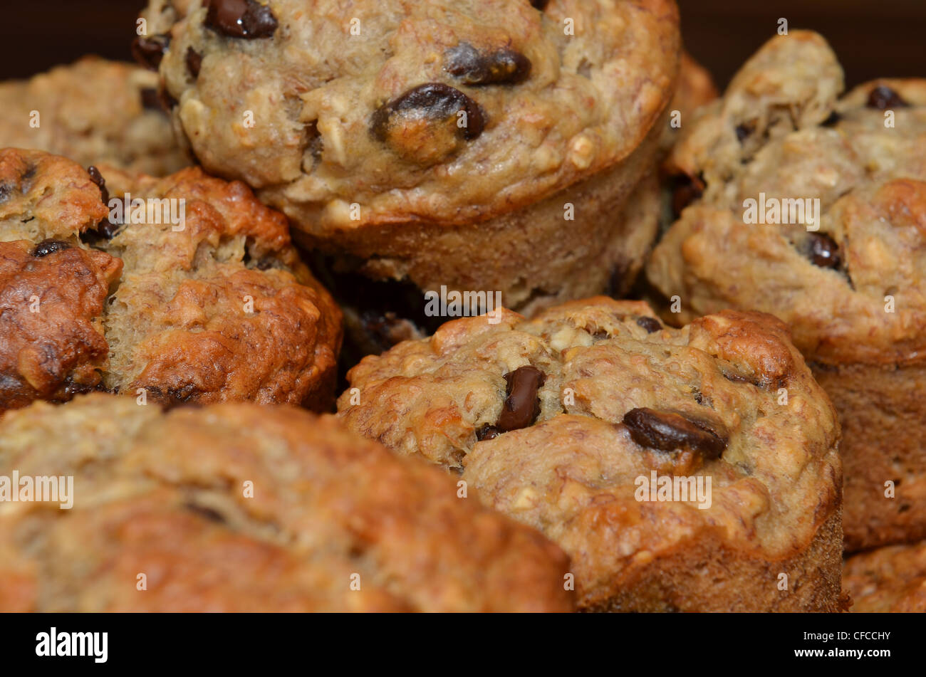 Fresh Delicious Chocolate Chip Muffins Stacked And Close Up Stock Photo