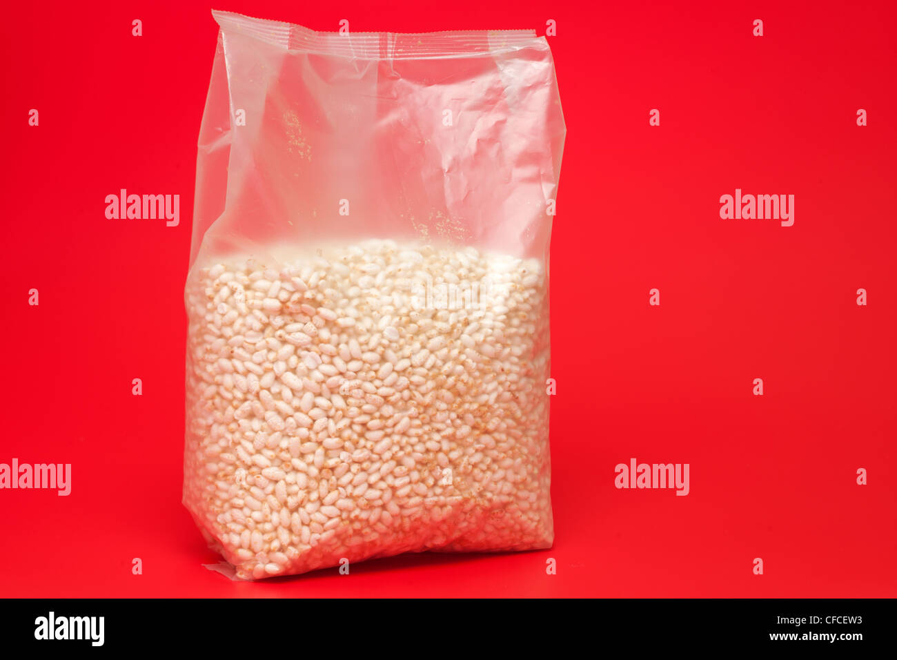 Cellophane bag full of wholegrain puffed rice Stock Photo