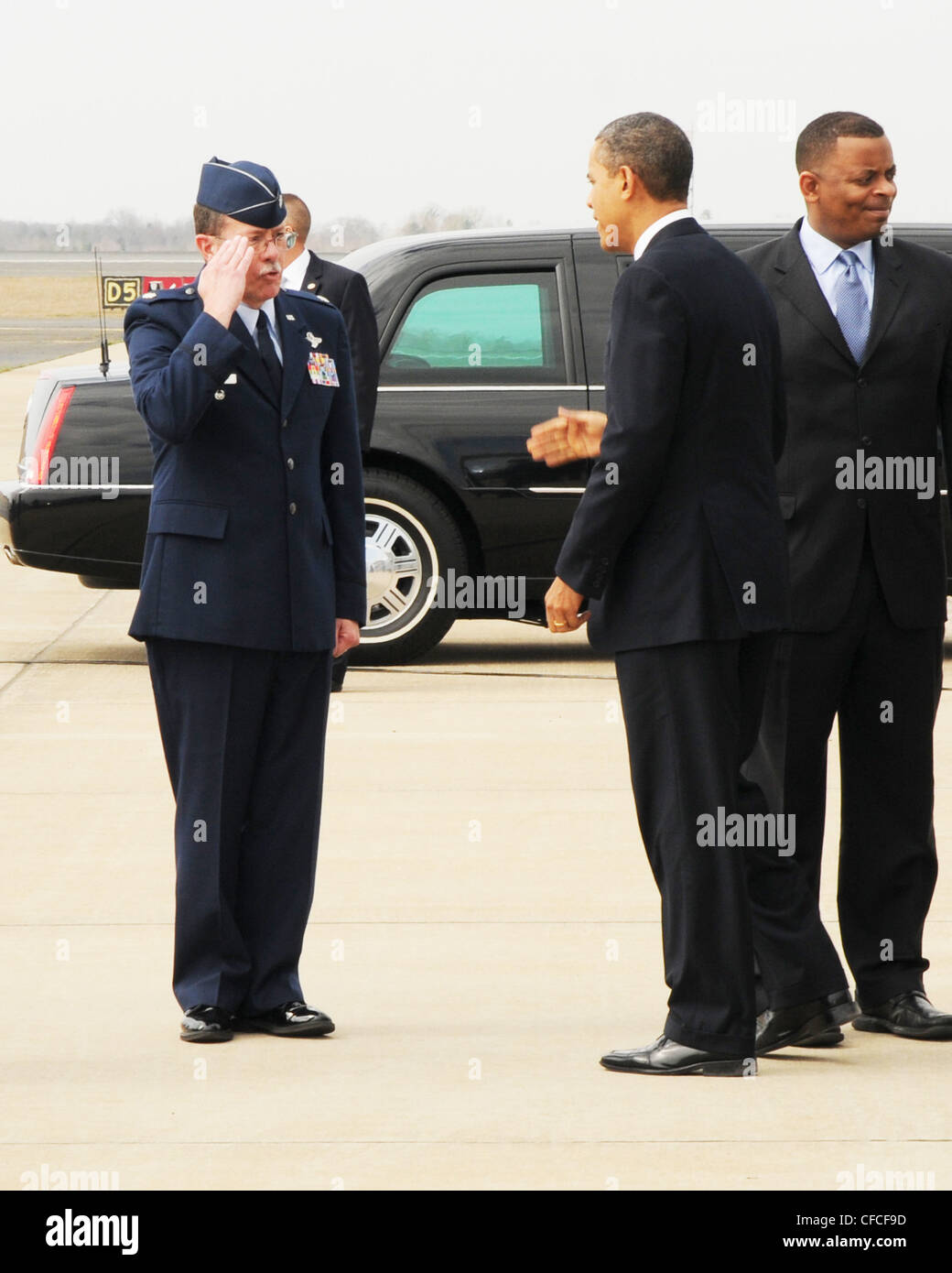 President Obama is welcomed by Lt Col Quincy Honeycutt upon arrival at the 145th North Carolina Air National Guard base in Charlotte, N.C. Stock Photo