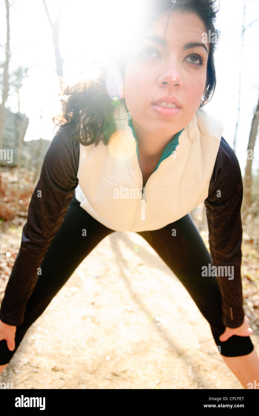Young female stretching in woods hi-res stock photography and images ...