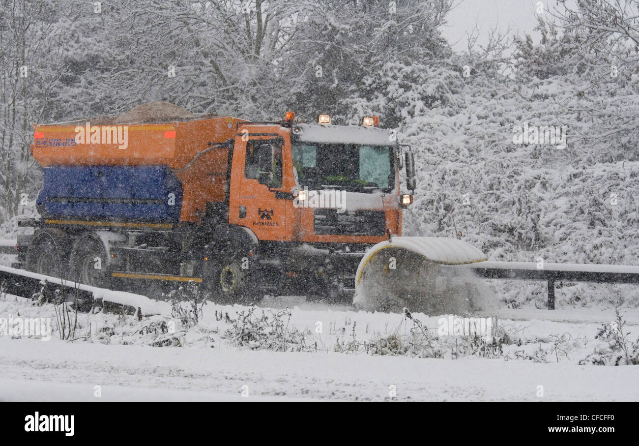 A snow plough on the M4 Berkshire UK Stock Photo Alamy