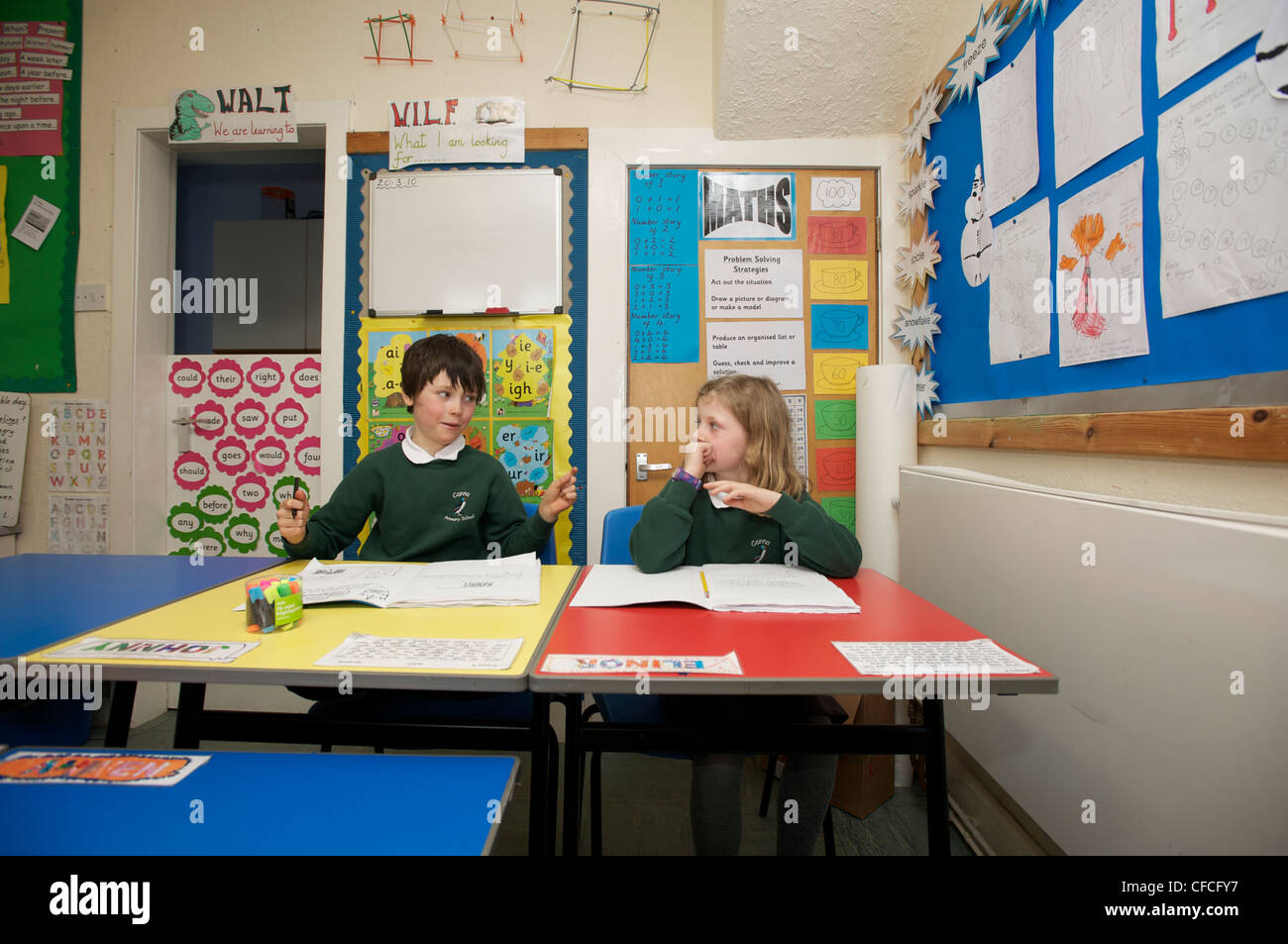 Children in the classroom on Canna. The island of Canna in the Inner Hebrides off the west coast of Scotland. Stock Photo