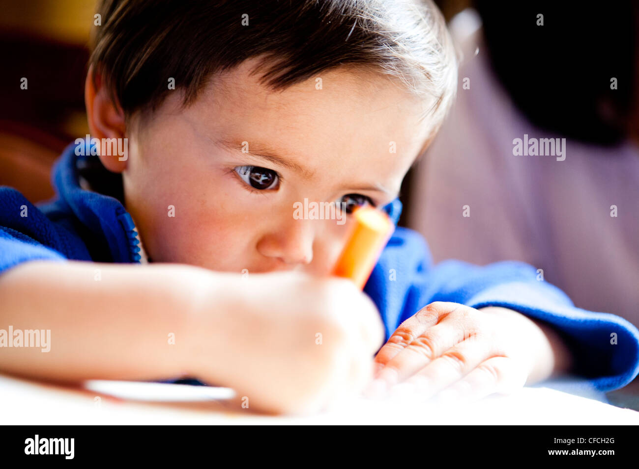 a 2 year old boy drawing Stock Photo