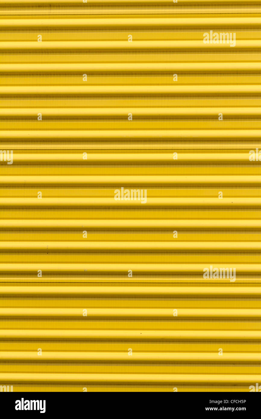 Yellow paint Corrugated Metal for textured background Stock Photo