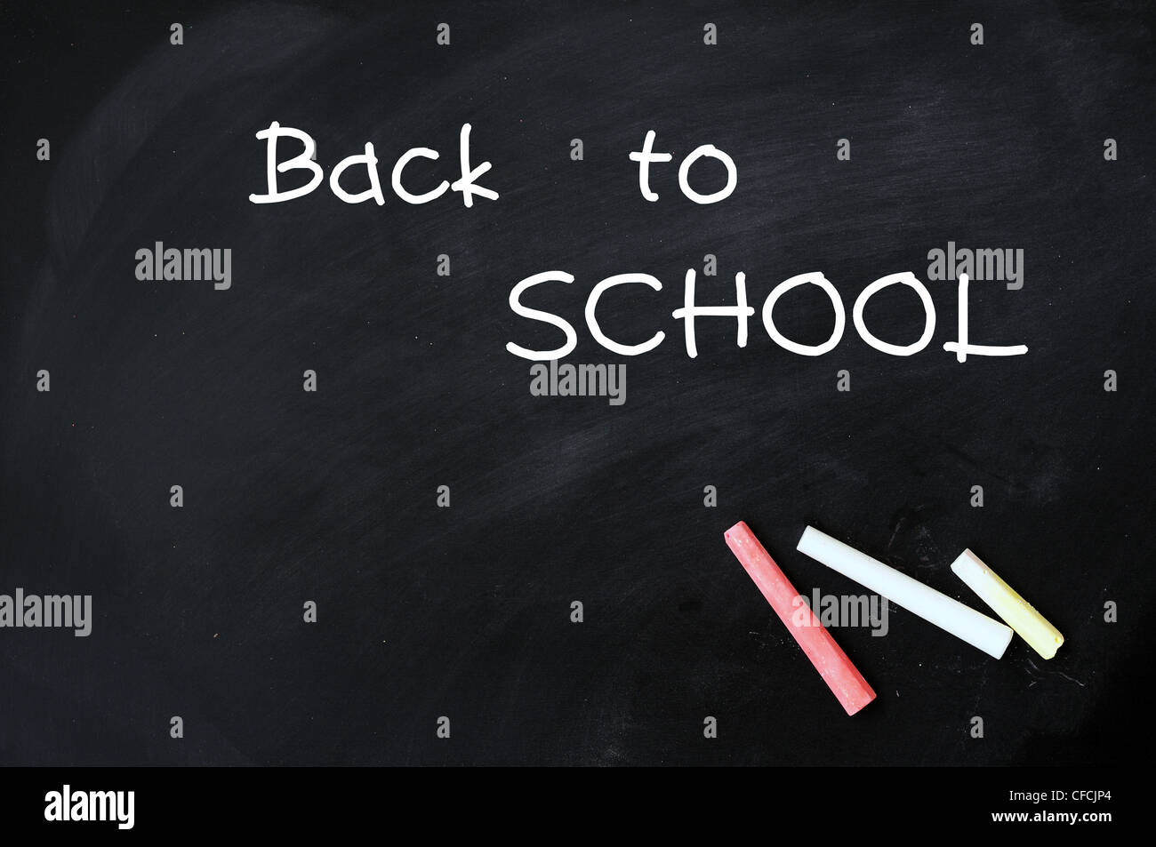 Chalkwriting of Back to School on a blackboard Stock Photo Alamy
