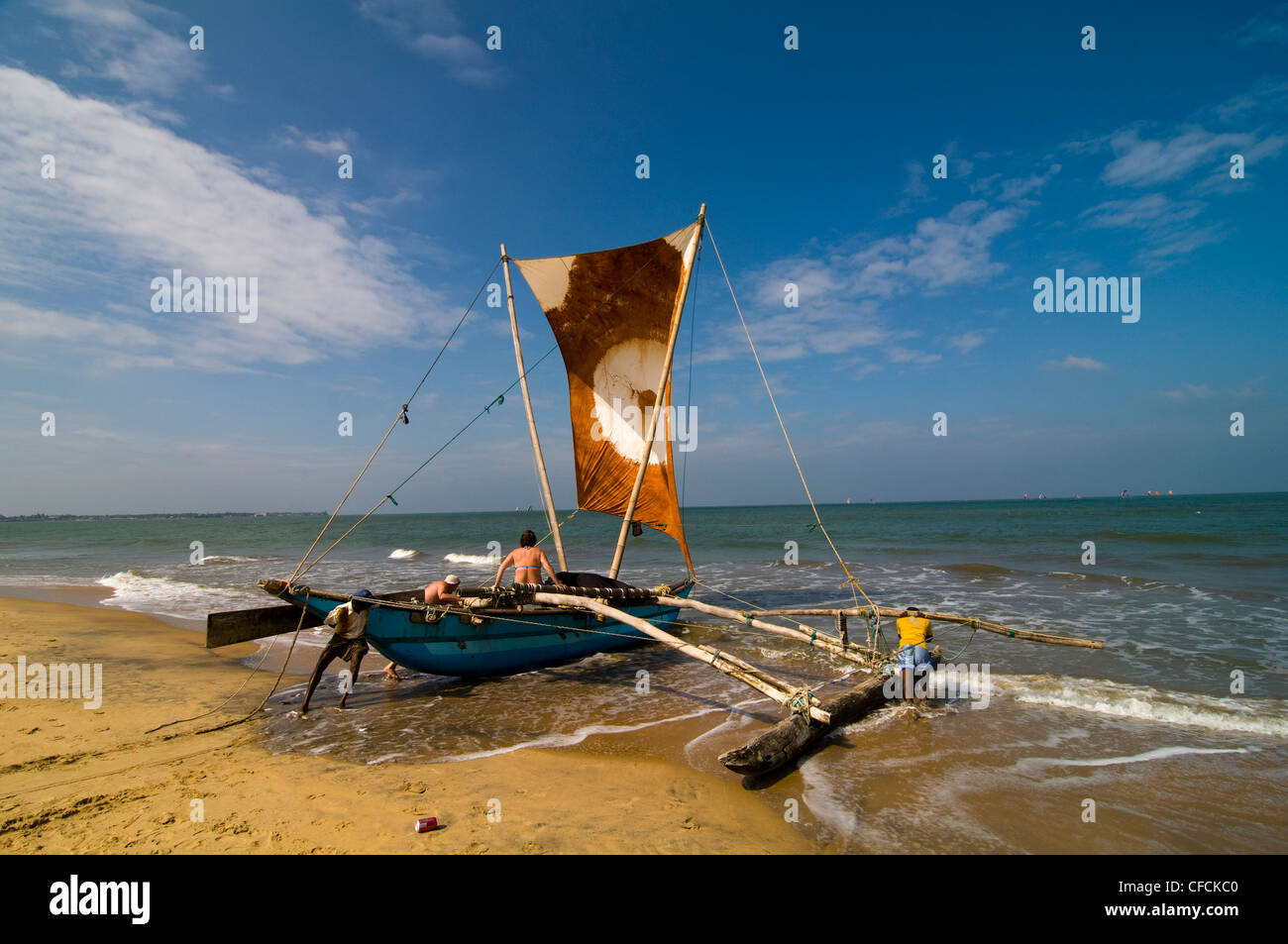A beautiful catamaran boat with tourist on board set to sail the sea