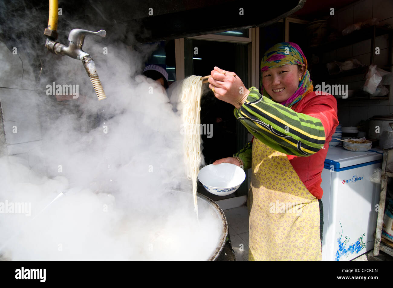Cooking the Lanzhou hand pulled noodles in China. Stock Photo