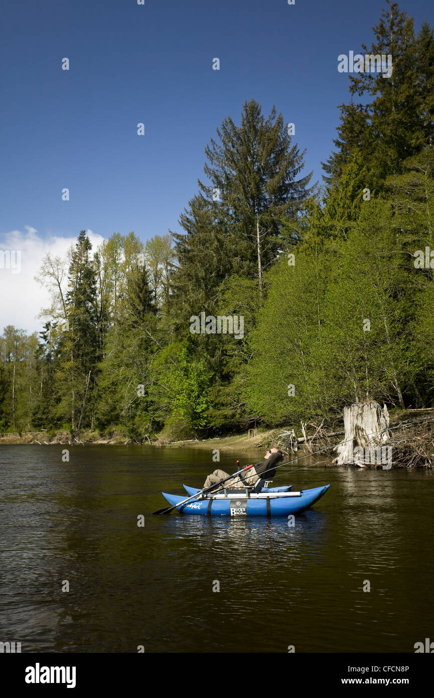 A flyfisherman on the Salmon River, Sayward, Northern Vancouver Island, British COlumbia, Canada. Stock Photo