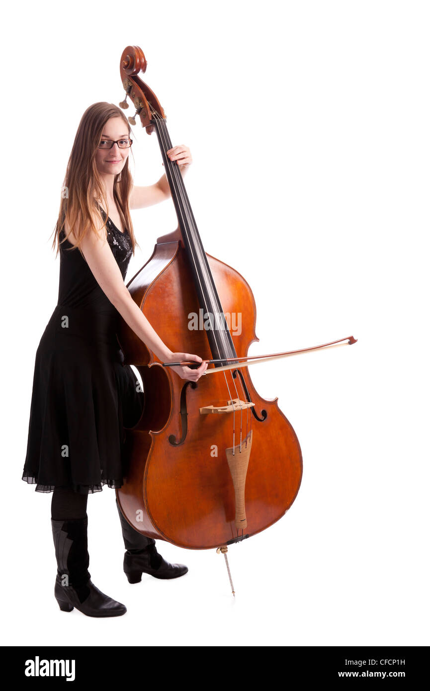 young woman playing the bass. Isolated on white background Stock Photo