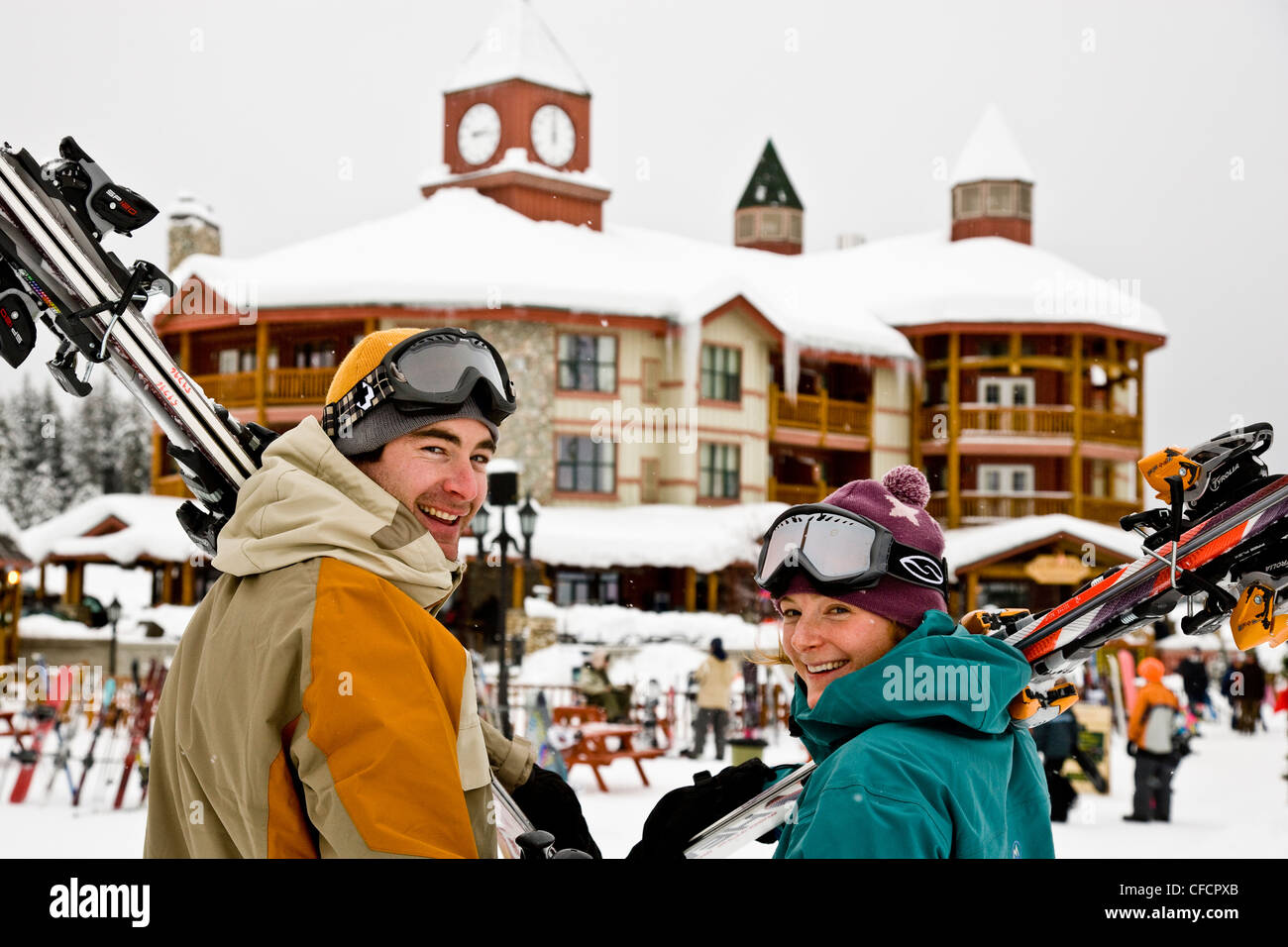 Young couple enjoy day of skiing at Kimberley Alpine Resort, British Columbia, Canada. (model release #'s 07120, 07121) Stock Photo