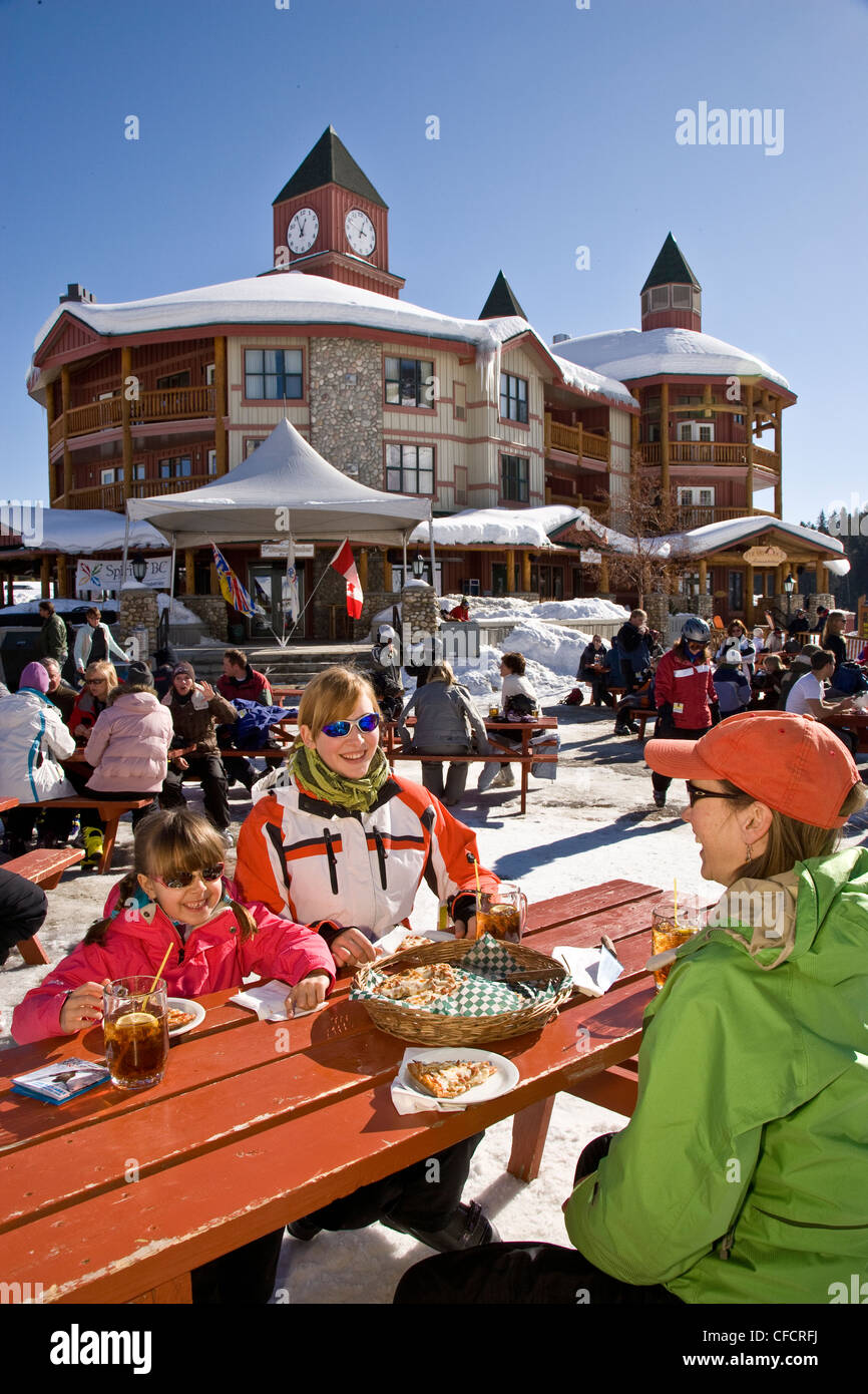 Family enjoys day of skiing at Kimberley Alpine Resort, British Columbia, Canada. (model release #'s 08302, 08303, 08304) Stock Photo
