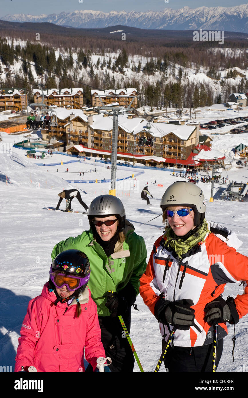 Family enjoys day of skiing at Kimberley Alpine Resort, British Columbia, Canada. (model release #'s 08302, 08303, 08304) Stock Photo