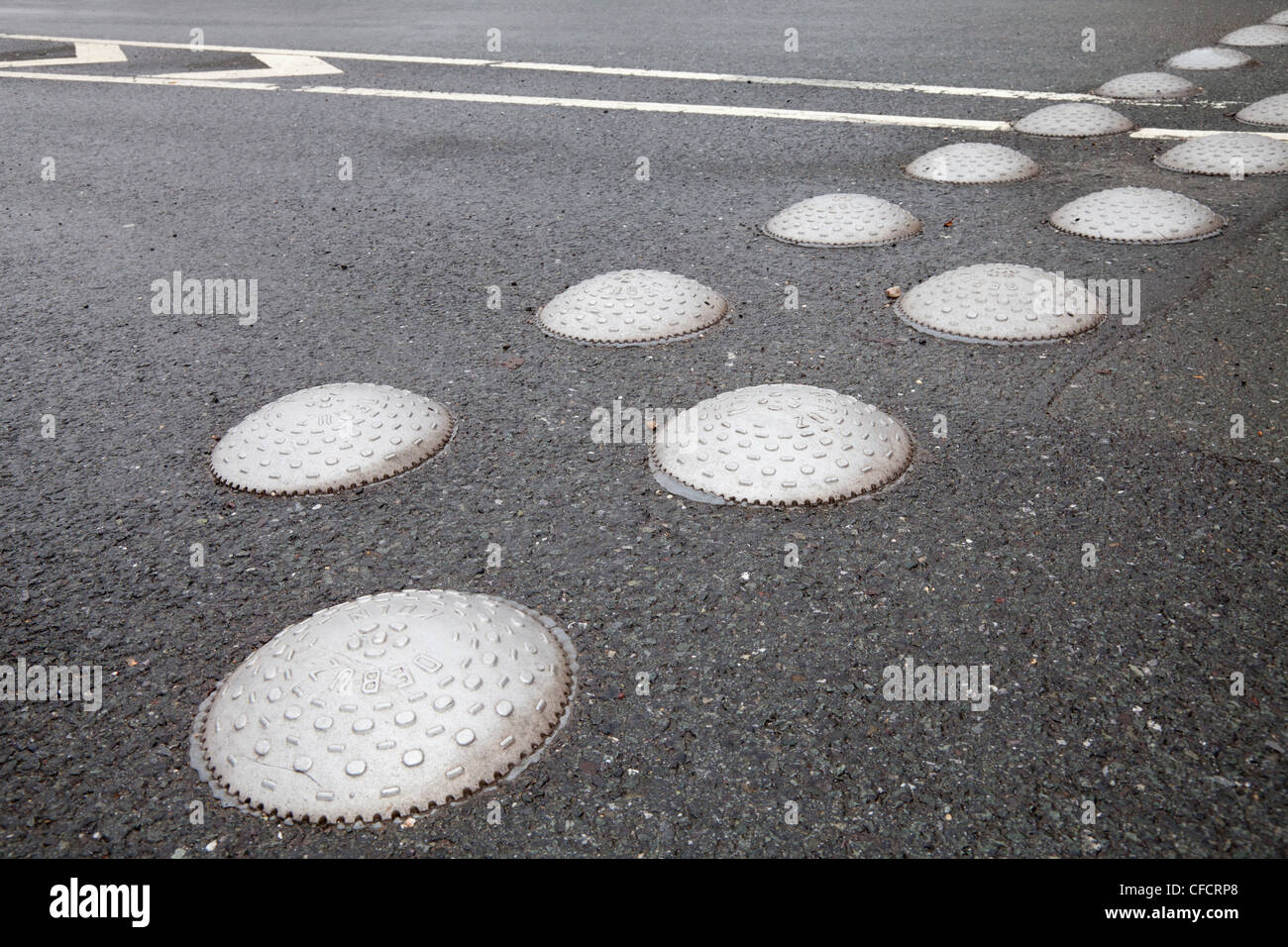 Road with speed bumps Stock Photo Alamy