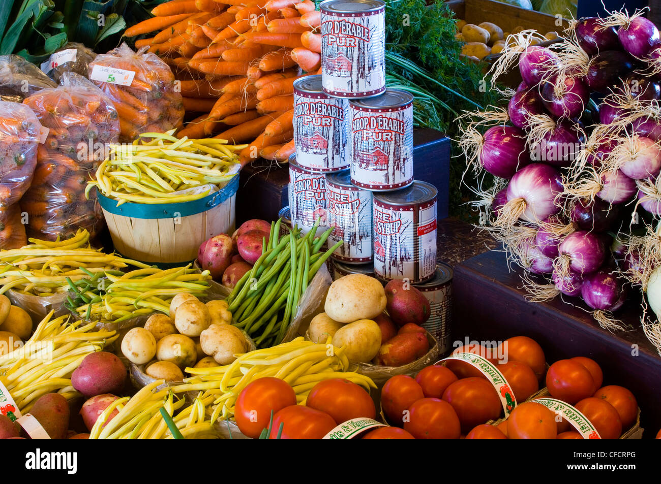 Produce and maple syrup on display in market, Quebec City, Quebec