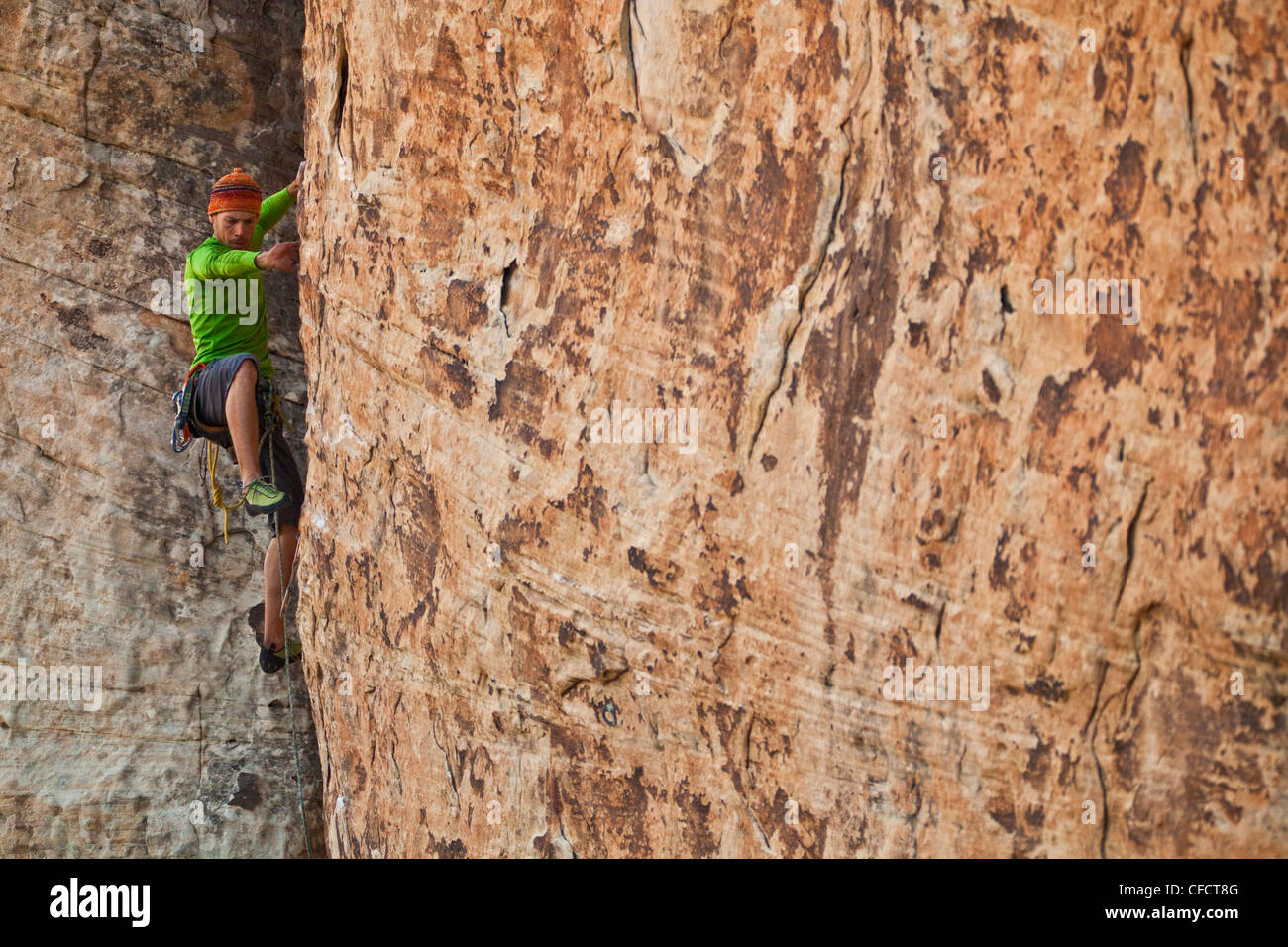 A male climber sport climbing in Red Rocks, Las Vegas, Nevada, United