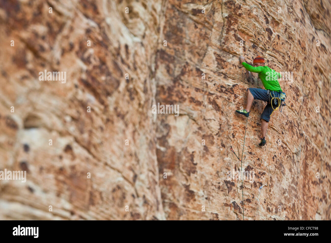 A male climber sport climbing in Red Rocks, Las Vegas, Nevada, United States of America Stock